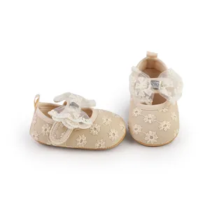 Beige mesh baby princess shoes with delicate floral embroidery and lace bow detail.