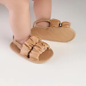 Detailed view of camel soft-sole baby prewalker sandals with ruffled straps for infants