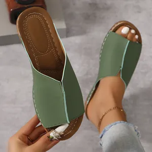 Stylish green women's wedge sandals featuring an open fish mouth design and durable thick brown soles