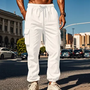 Street lifestyle view of men's white cotton linen cargo joggers with drawstring waist.