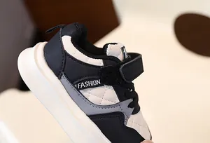 Close-up of children's thick-soled sneakers with quilted pattern and Velcro strap