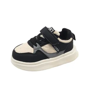 Stylish kids' casual sneakers with thick soles and trendy black beige quilted design.