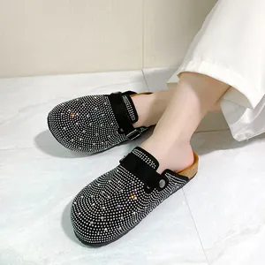 Stylish black platform clogs for women featuring sparkling rhinestone decorations