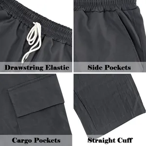 Detailansicht der anthrazitfarbenen Cargo-Hose für Herren mit Kordelzug und Taschen.