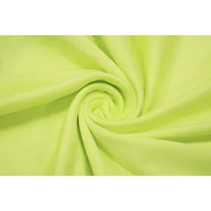 Detaillierte Nahaufnahme der Textur und Farbe des neon-gelben Bandage-Kleid-Stoffs