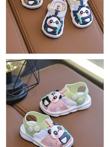 Close-up detail of cute panda cartoon character on baby non-slip soft sole sandals