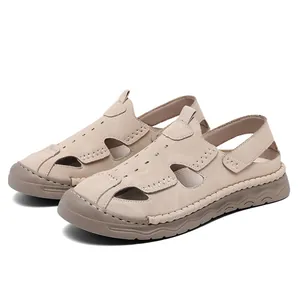 Detailed macro view of men's breathable beige closed-toe casual beach sandals for summer