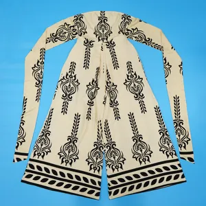 Detailed view of women's strapless wide-leg jumpsuit with vintage black print