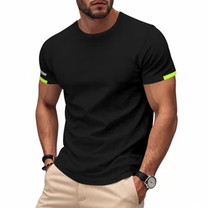 Close-up detail of a men's athletic quick-dry black sports t-shirt with neon sleeve accents