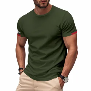 Close-up of olive green athletic T-shirt featuring red contrast sleeve details