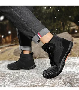 Action shot highlighting the flexibility of black high-top outdoor winter snow boots