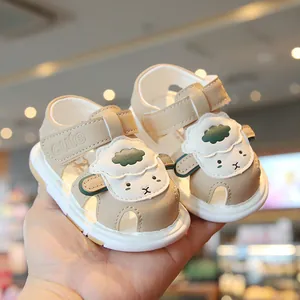 Adorable infant sandals with cartoon sheep design and soft non-slip soles for toddlers