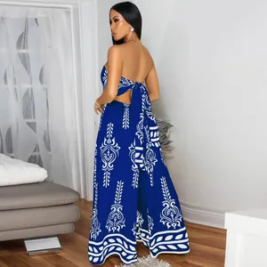 Detailed back view of blue and white patterned backless jumpsuit with wide-leg cut
