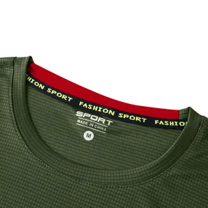 Detail of men's green quick-dry sports t-shirt showing the collar and size label M
