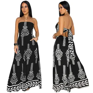Detail view of black and white printed tube top jumpsuit with backless tie design