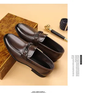 Elegant brown calfskin leather loafers for men featuring a stylish metal buckle design