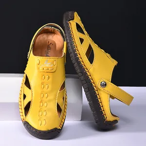 Side detail of bright yellow breathable leather cutout sandals with closed toe design