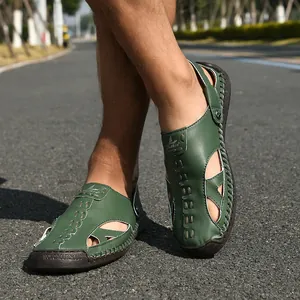 Close-up detail of green closed-toe beach sandals with breathable cutout design