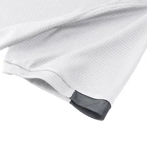 Detailed macro view of white quick-dry sports t-shirt fabric with micro-grid texture