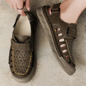 Breathable men's hollow-out casual leather sandals for summer outdoor beach wear in brown.