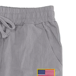 Détail de la taille du pantalon décontracté en lin pour homme avec drapeau américain