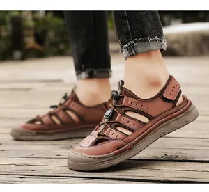 Detailed view of breathable men's mesh outdoor sandals with stitched brown leather