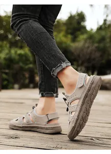 Detail view of breathable men's mesh sandals featuring side stitching and durable sole.