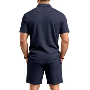 Back view of men's navy blue jacquard polo and shorts set with diamond texture.