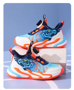 Side view of boy's sports sneakers featuring tiger graphic and dial lacing system