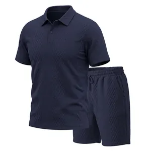 Men's navy blue polo and shorts set featuring a textured jacquard pattern detail