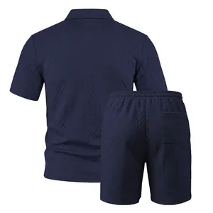 Detailed back view of navy blue men's textured knit polo shirt and matching shorts set