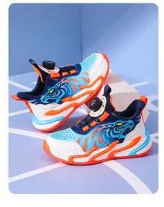 Detailed side view of boys basketball shoes with convenient rotary buckle and tiger graphic