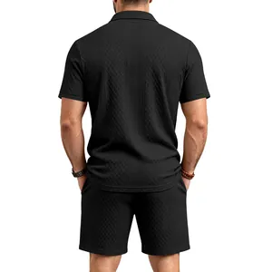 Back view of black heavy jacquard men's summer polo shirt and shorts set showing fabric texture.