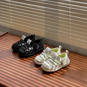 Breathable toddler closed-toe summer sandals in black and beige with soft soles