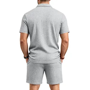 Detailed back view of premium grey textured jacquard polo shirt and shorts set for men.