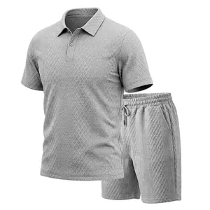 Detail view showing the heavy jacquard diamond texture of the grey Polo shorts set