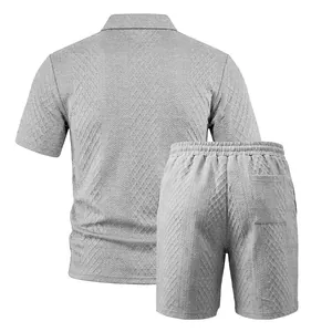 Back view of premium grey jacquard knit short sleeve polo and matching shorts outfit