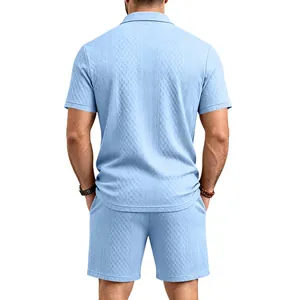 Back view of a men's light blue jacquard knit Polo shirt and matching shorts set.