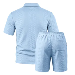 Detailed view of light blue men's jacquard polo and shorts set with diamond texture.