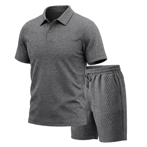 Detailed view of men's grey heavy jacquard polo shirt and matching shorts leisure set