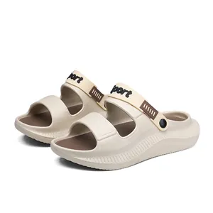 Detail view of beige outdoor sandals with adjustable heel strap and sport text.