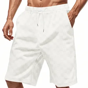 Close-up view of men's casual shorts with heavy jacquard checkerboard texture
