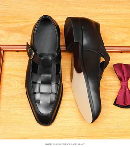 Detail view of men's black leather Roman woven sandals with breathable hollow design
