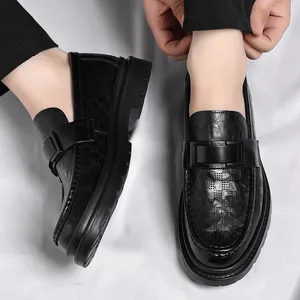Premium men's black breathable laser-cut leather loafers featuring decorative buckle detail