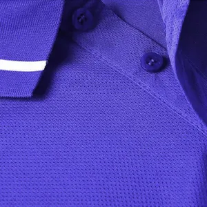Close-up detail of blue quick-dry breathable mesh fabric on a polo shirt collar