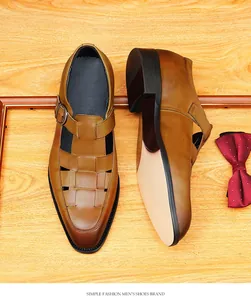 Close-up of brown woven leather men's sandals with buckle detail and textured sole.