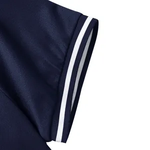 Close-up detail of navy blue Polo shirt sleeve with white striped ribbed cuff texture.