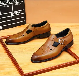 Close-up of men's brown woven leather sandals with a stylish metal buckle strap detail.