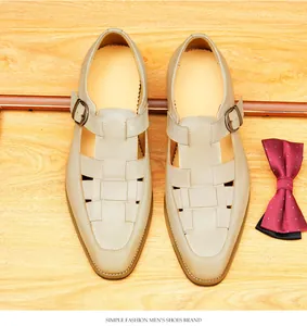 Top view detail of men's cream woven leather sandals with metallic buckle closure