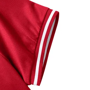Macro detail showing the texture and double white striped cuff of a red quick-dry Polo shirt.